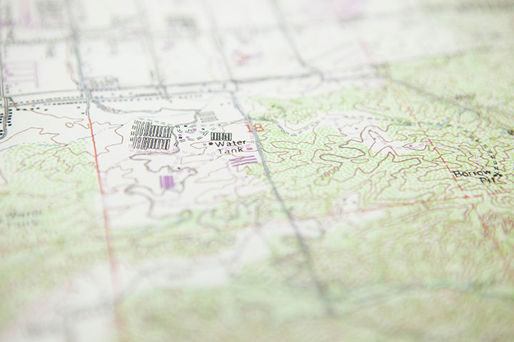 A close-up view of a topographical road map