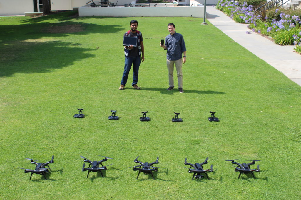Gradaute student, Dhruvil Darji, and Prof Gustavo Vejarano research embedded systems using drones.
